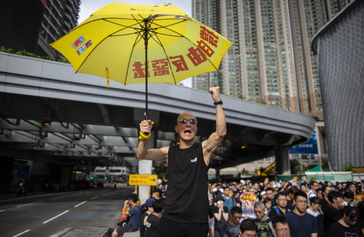 epa07700889 Anti-extradition bill protesters take part in a march to West Kowloon railway station in Hong Kong, China, 07 July 2019. The march aims to spread the spirit of resistance all over the land from Hong Kong Island to Kowloon, and even to Mainland China, according to the organizers.  EPA/CHAN LONG HEI