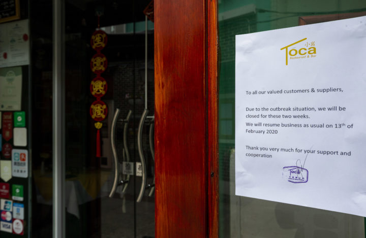 A brochure is seen at the door of a restaurant informing the customers that due to the Coronavirus the restaurant will be closed for the next two weeks, in Macau, China, 07 February 2020. The coronavirus outbreak is contaminating local Portuguese businesses in Macao, robbing customers and hoping to recover, in some cases, the financial health that protests in Hong Kong had already compromised. CARMO CORREIA/LUSA